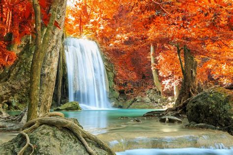 Amazing Nature Autumn Landscape With Waterfall In The