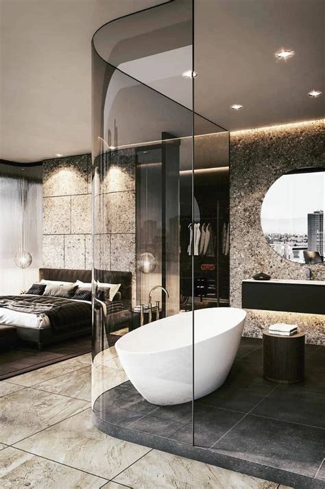 A Bathroom With A Large Bathtub Next To A Bed In The Middle Of It