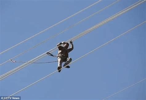 Video Of Chinese Workers Perching On High Voltage Power Lines For