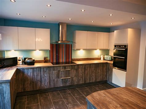 If your kitchen island is large, then the seating for it can utilize full size chairs. Pasadena pine and light grey gloss kitchen | Kitchen ...