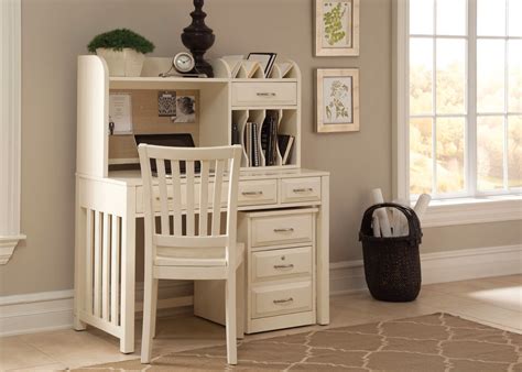 Purchasing white desks and home office furniture is on the rise. Hampton Bay Antique White Finish Home Office Desk