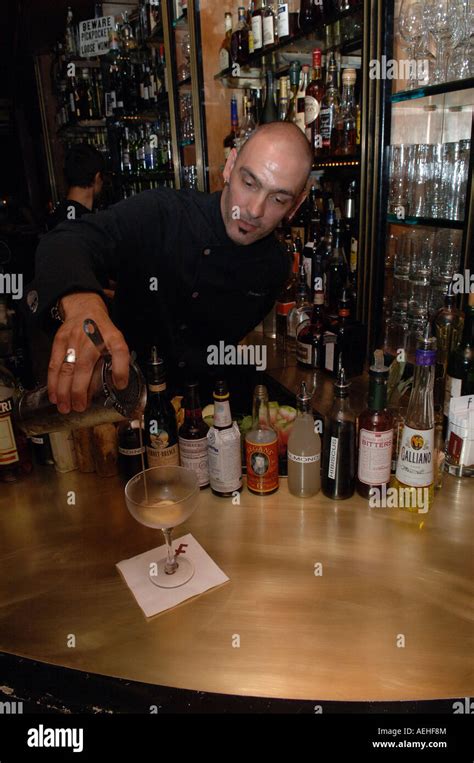 Bartender Pours Mixed Drink At Employees Only Bar In Greenwich Village