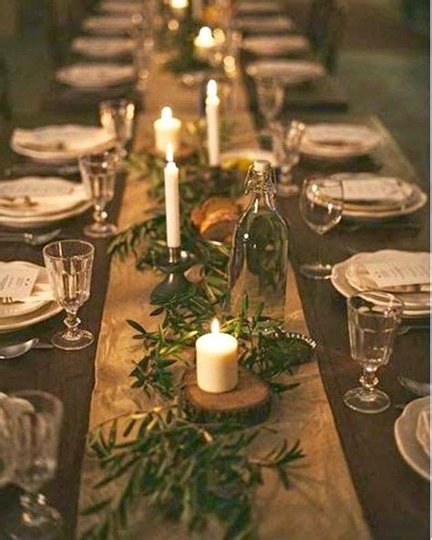 Rosemary On The Candles On Wood Slabs Christmas Table Decorations