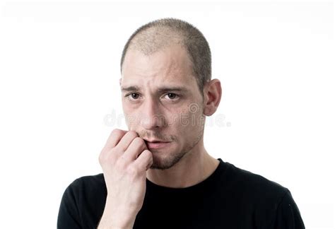 Close Up Portrait Of Sad Young Man Face Suffering From Depression