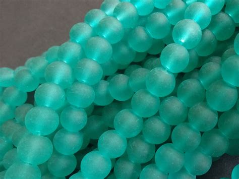8mm green glass frosted bead strand about 105 beads per strand round 31 inch strand cool
