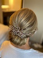 Sleek, voluminous blonde bridal chignon | Best bridal makeup, Bridal ...