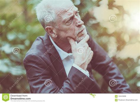 Portrait Of Thoughtful Mature Man Light Effect Stock Photo Image Of