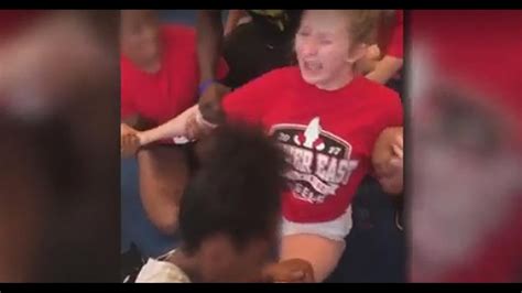 Video Shows Denver High School Cheerleaders Held Down Forced Into