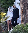 Kourtney Kardashian marries Travis Barker in dress featuring cathedral veil in first wedding ...