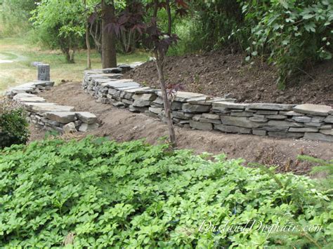 How To Install Stacked Stone Garden Wall 101 Resources Stacked