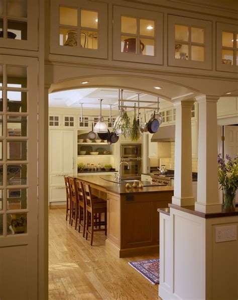 The wood floor is pale enough to maintain the light feeling of the room. Wonderful ideas for dining room cabinets