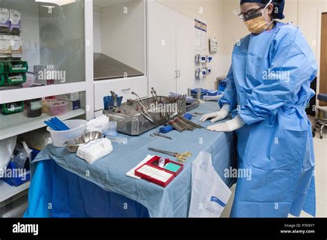 Surgical Instrument Technician In Operating Room Stock Photo Alamy