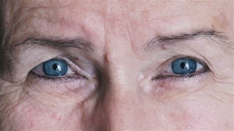 elderly woman with blue eyes close up stock video footage storyblocks