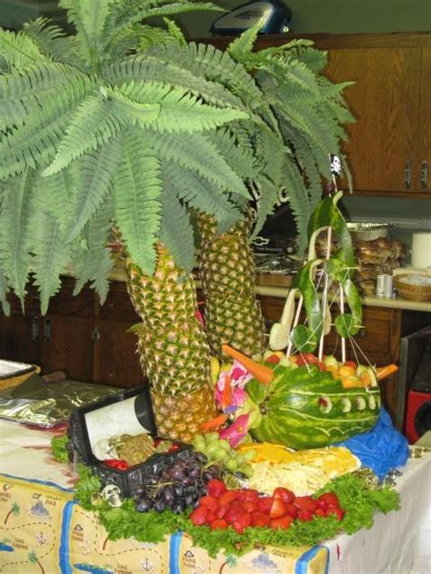 The pineapple has too much liquid in it and the palm tree won't last that long. Pineapple palm trees and melon boat. (With images) | Fruit ...