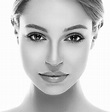Beautiful woman face close up studio black and white - WAXmd