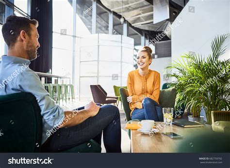 Cheerful Coworkers Chatting Waiting Lunch While Stock Photo 682759792