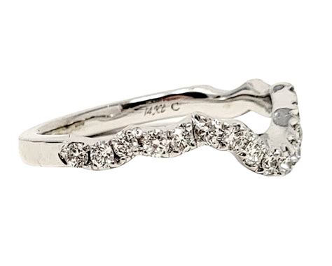 neil lane pear and round diamond halo wedding ring set in 14 karat white gold for sale at