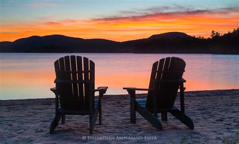 Free red adirondack chair on a brick patio. Adirondack Chairs on Blue Mountain Lake ...