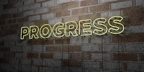 Progress Glowing Neon Sign On Stonework Wall 3d Rendered Royalty