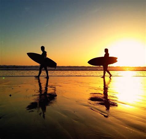 Surfing At Sunset In California Sunset Surf Surfing California Summer