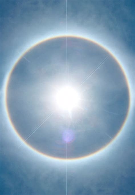 Some say that this while we were on a sacred journey in fiji, after finishing the second dive (scuba) of the day, i saw a dramatic large rainbow around the sun just above us. Free Sun with rainbow halo Stock Photo - FreeImages.com