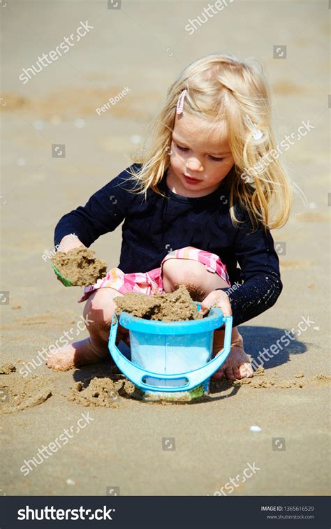 Cute Little Girl Playing Sand On Stock Photo 1365616529 Shutterstock