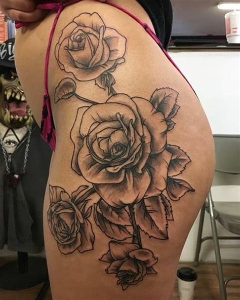 It features a beautiful single rose, compass and feathers. Beautiful Rose Floral Tattoo On Thigh - Blurmark