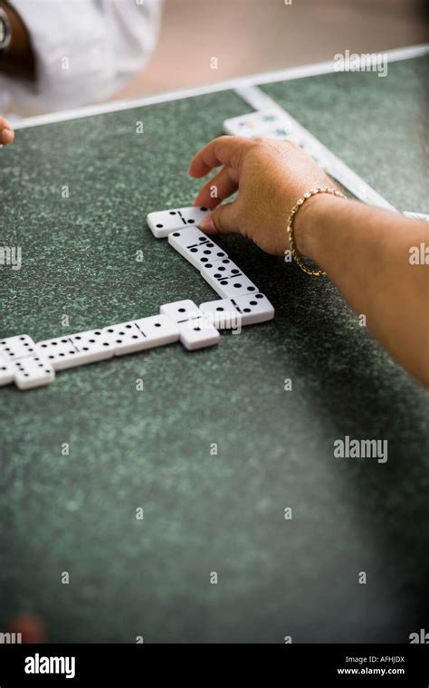Men Playing Dominos Stock Photo Alamy