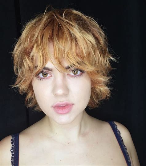 Strawberry Blonde Shag With Undone Textured Waves And Bangs The