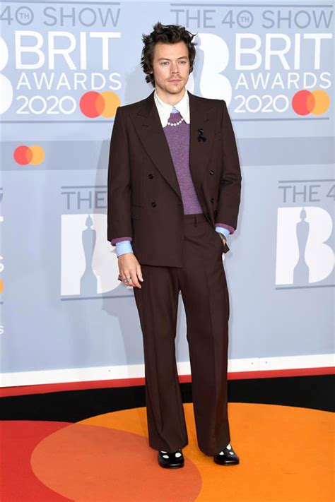 And in dreamy folds of voluminous silver blue tulle, ariane. Harry Styles in Gucci at the BRIT Awards 2020 | Tom + Lorenzo