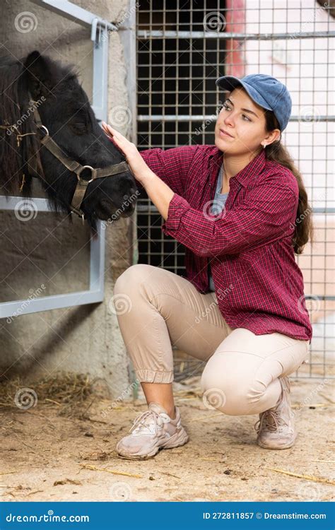 European White Female Farmer Taking Care Of Pony Stock Image Image Of