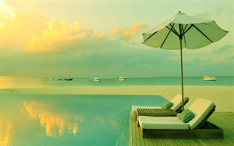 Sun Setting Over Luxury Tropical Resort