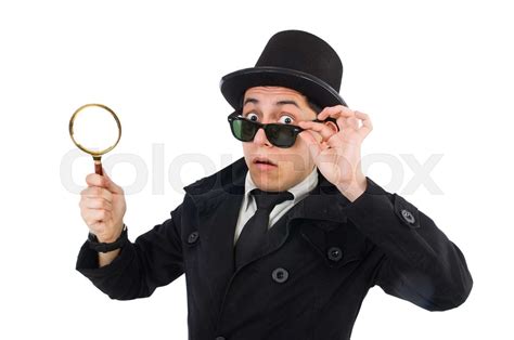 Young Detective In Black Coat Holding Magnifying Glass Isolated Stock