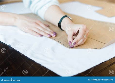 Attaching Sewing Pattern To Fabric Stock Photo Image Of Sitting
