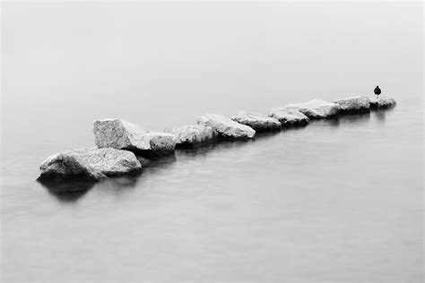 On The Rocks A Minimalist Lake Landscape In Bandw Nio Photography