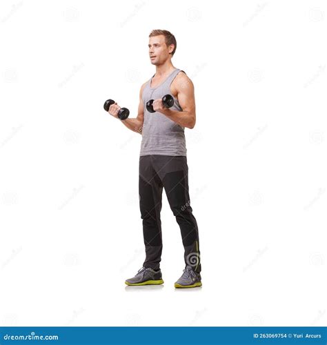 Toning His Biceps Full Body Of A Fit Young Man Doing Bicep Curls While