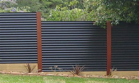 My corrugated metal fences (ceiling tiles and corrugated steel) are finished! Used Corrugated Metal as Fencing | Corrugated Metal Fence ...