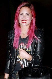 In 2012, she decorated a platinum blond hairstyle with pink highlights and jumped on the lavender trend in 2014. Demi Lovato debuts bright pink hair (& Rod Stewart T-Shirt ...