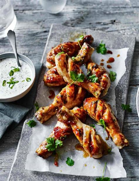 Sticky spiced chicken drumsticks recipe | Sainsbury's Magazine