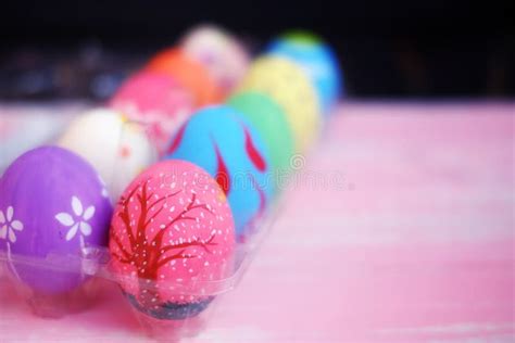 Pastel Hand Painted Easter Eggs With Pink Background Stock Image