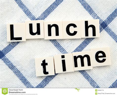 Lunch Time Alphabets Block On Table Cloth Background Stock Photo