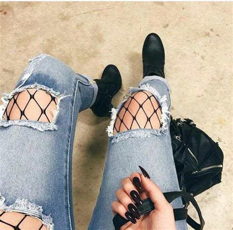 black pantyhose under jeans pantyhose in a grid under tattered jeans