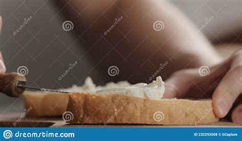 Spread Cream Cheese On Fresh Ciabatta Slice On Olive Board Closeup Stock Photo Image Of Fast