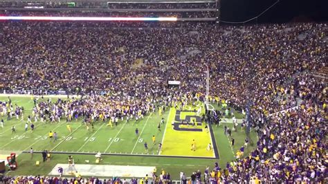 Lsu Fans Storm Field After Victory Over Ole Miss Youtube