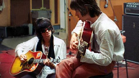 watch keith richards and mick jagger writing “sympathy for the devil” using their trusty gibson