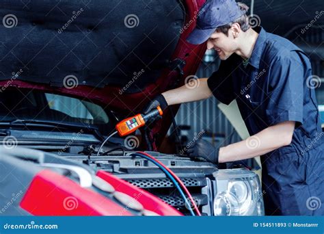 Mechanic Engineer Repair Car At Car Service Station Stock Image Image