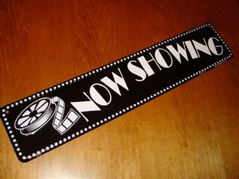 Now Showing Marquee Sign Cinema Movie Theater Entertainment Room Reel