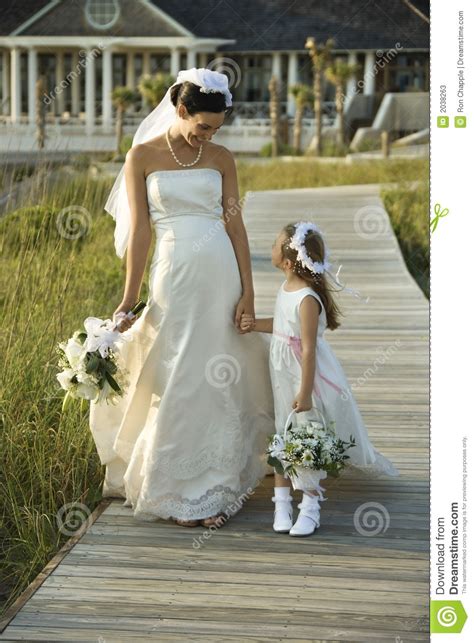 Bride And Flower Girl Walking Stock Image Image Of