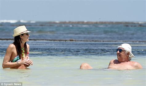 Flavio Briatore Kisses Wife Elisabetta Gregoraci On Kenyan Beach As She Displays Trim