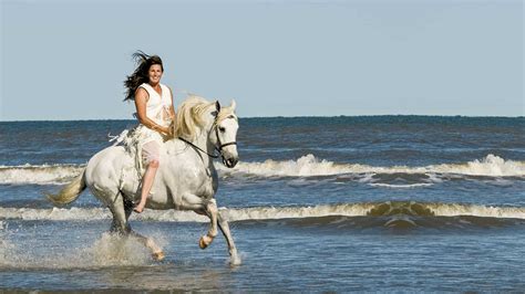 Sand Surf And Saddles Cowgirl Beach Rides Cowgirl Magazine